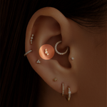 Gold Conch Piercings