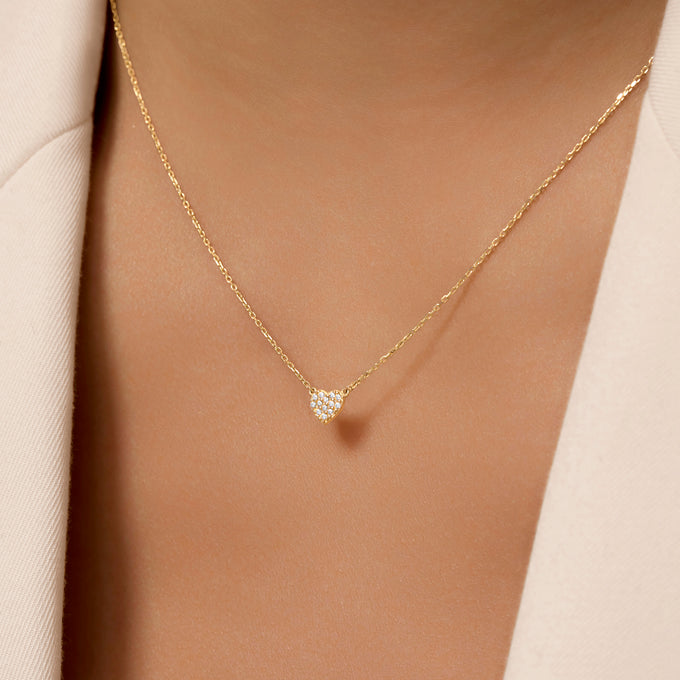 What type of stones are used in the heart jewellery designs?