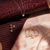 585er Gold Four Prong Round Cut Zirkonia Ohrstecker - 9