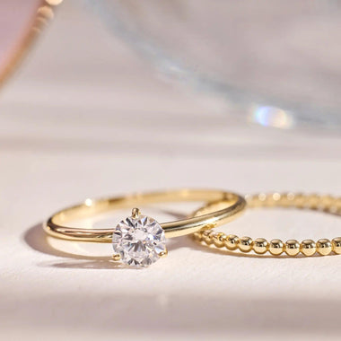 Gold Three Prong Round Cut Cubic Zirconia Ring of 14k Gold