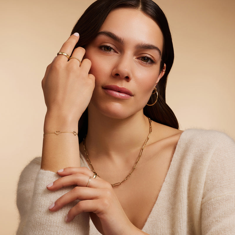 Stationed Open Heart Pendant Bracelet